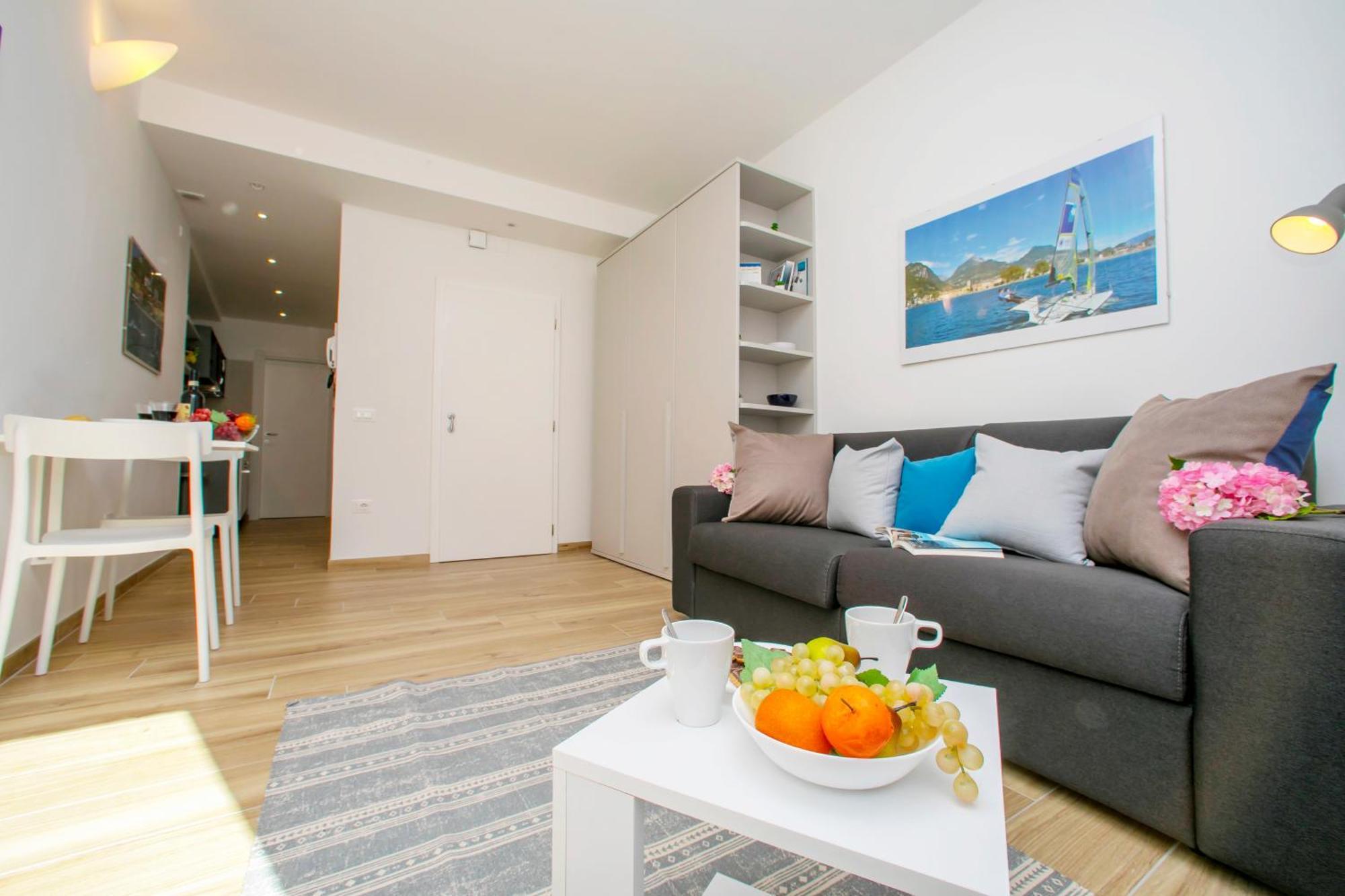 Nido Sui Tetti Di Riva Del Garda - Happy Rentals 외부 사진
